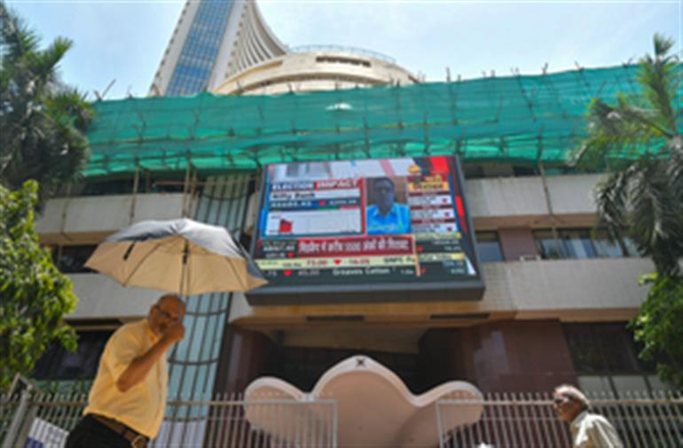 Sensex, Nifty end lower amid consolidation, investors await India-US trade deal